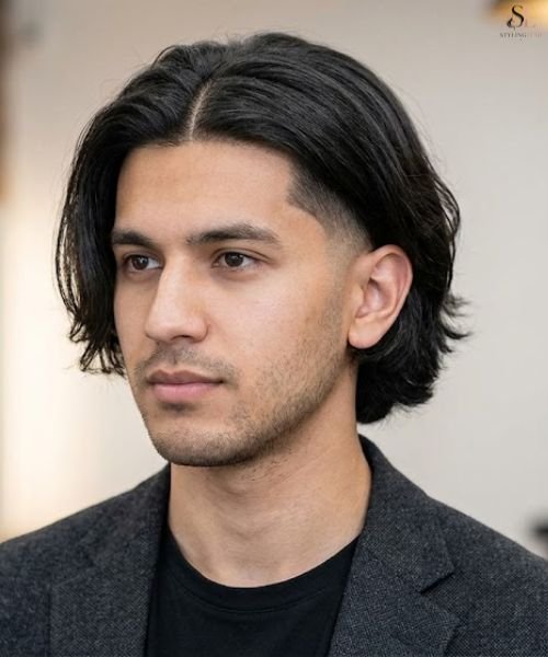 Mid Taper Fade with Middle Part