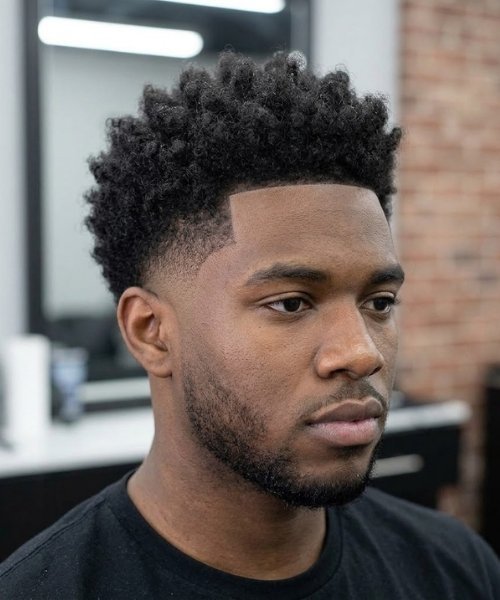 Curly and Textured Top Mid Taper Fades