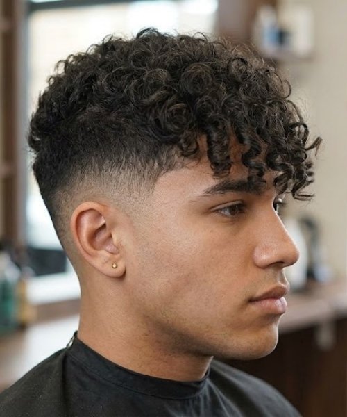 High Taper Fade with Curly Fringe