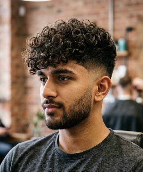 High Taper Fade with Long Curly Top