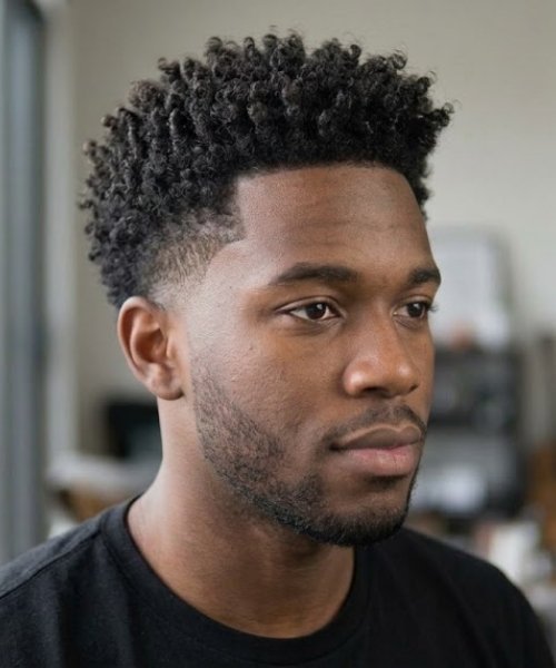 20. High Taper Fade with Natural Curly Volume
