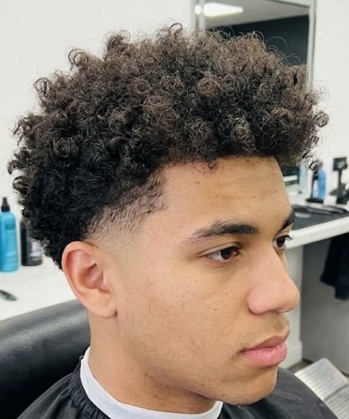 Low Taper Fade with Mixed Texture Curly Hair